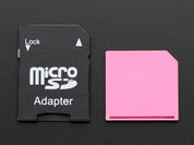 Pink Shortening microSD card adapter for Raspberry Pi & Macbooks