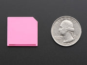 Pink Shortening microSD card adapter for Raspberry Pi & Macbooks
