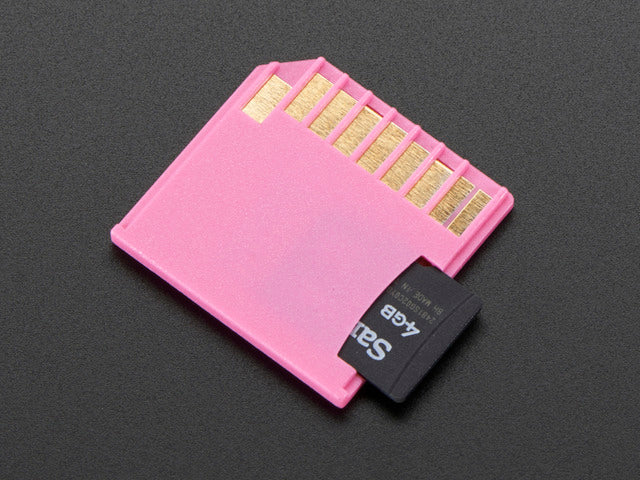 Pink Shortening microSD card adapter for Raspberry Pi & Macbooks