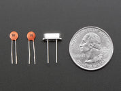 12 MHz Crystal + 20pF capacitors