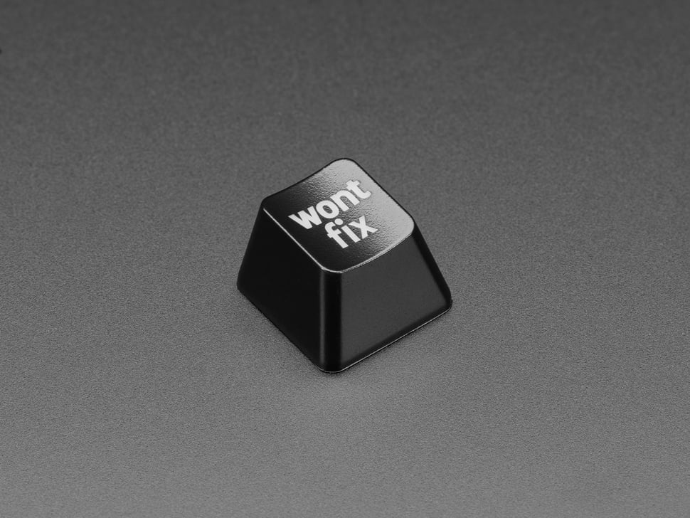 Etched Glow-Through Keycap with "wont fix" Text