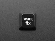 Etched Glow-Through Keycap with "wont fix" Text