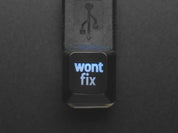 Etched Glow-Through Keycap with "wont fix" Text